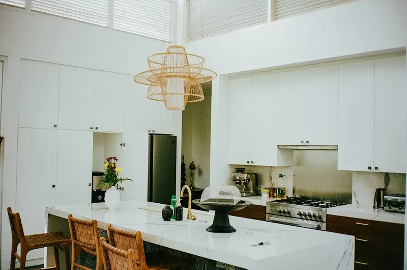 Modern kitchen with pendant lighting installed by Lilliput Electrical